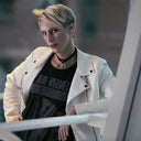 Model wearing one of our staple pieces, the Stirrup necklace