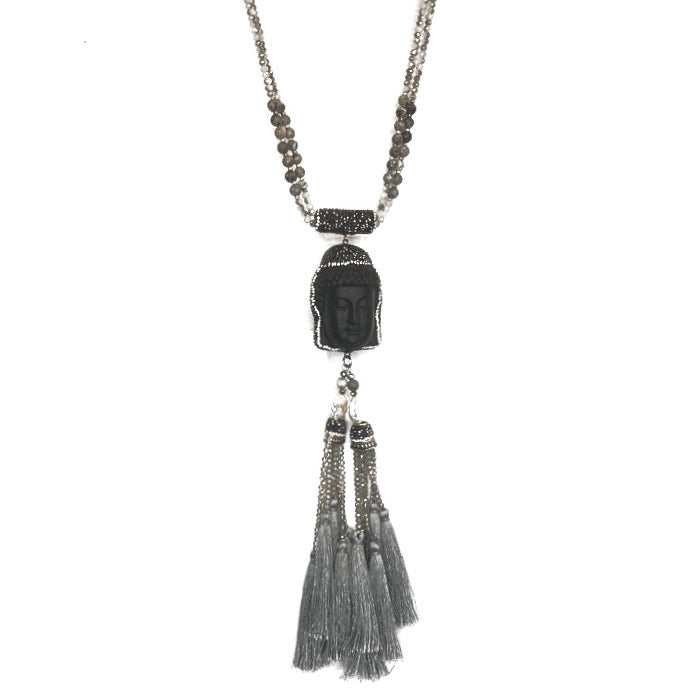 GREY FACETED CRYSTAL BEADS LONG NECKLACE ADORNED WITH WOODEN BUDDHA FACE PENDENT W/ PAVE RHINESTONES AND GREY SILK TASSELS.  by NYET Jewelry.