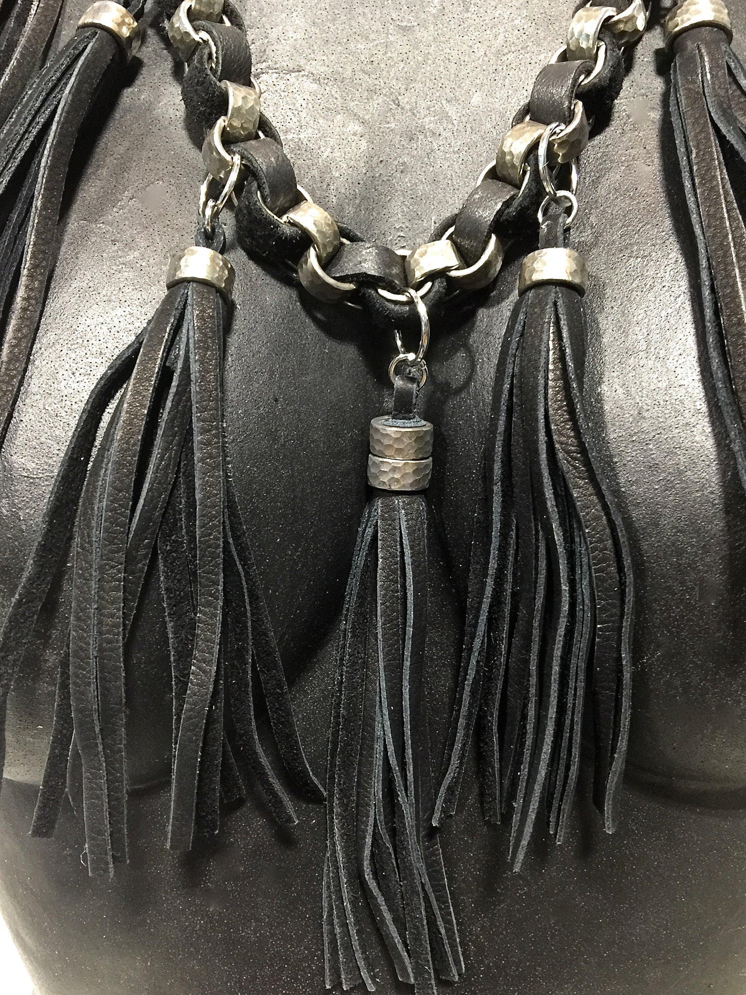 HAMMERED STEEL CHAIN AND DEERSKIN LEATHER WITH TASSELS by nyet jewelry.