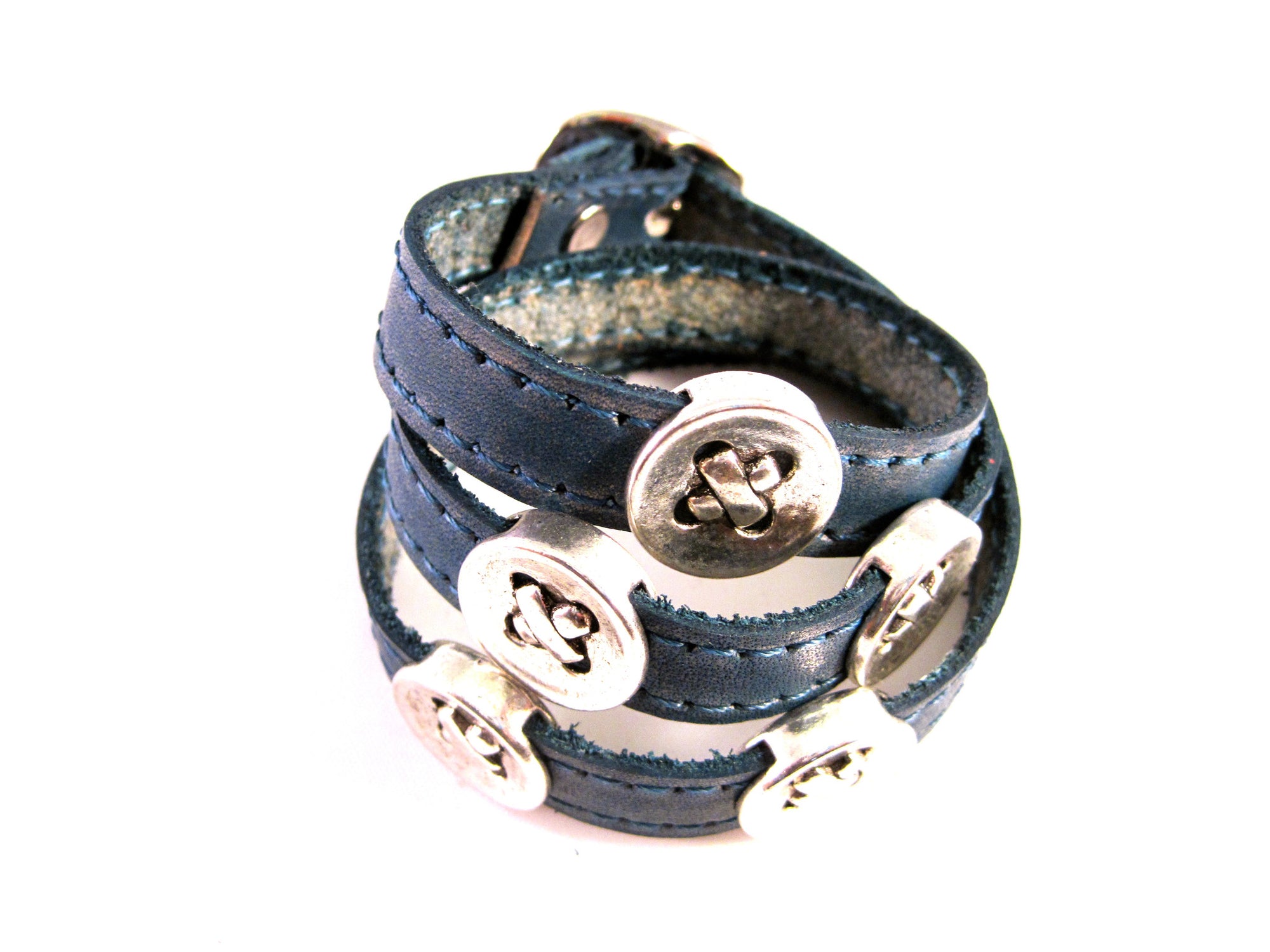 LEATHER WRAPAROUND WITH FIVE METAL BUTTONS by nyet jewelry.