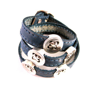 LEATHER WRAPAROUND WITH FIVE METAL BUTTONS by nyet jewelry.