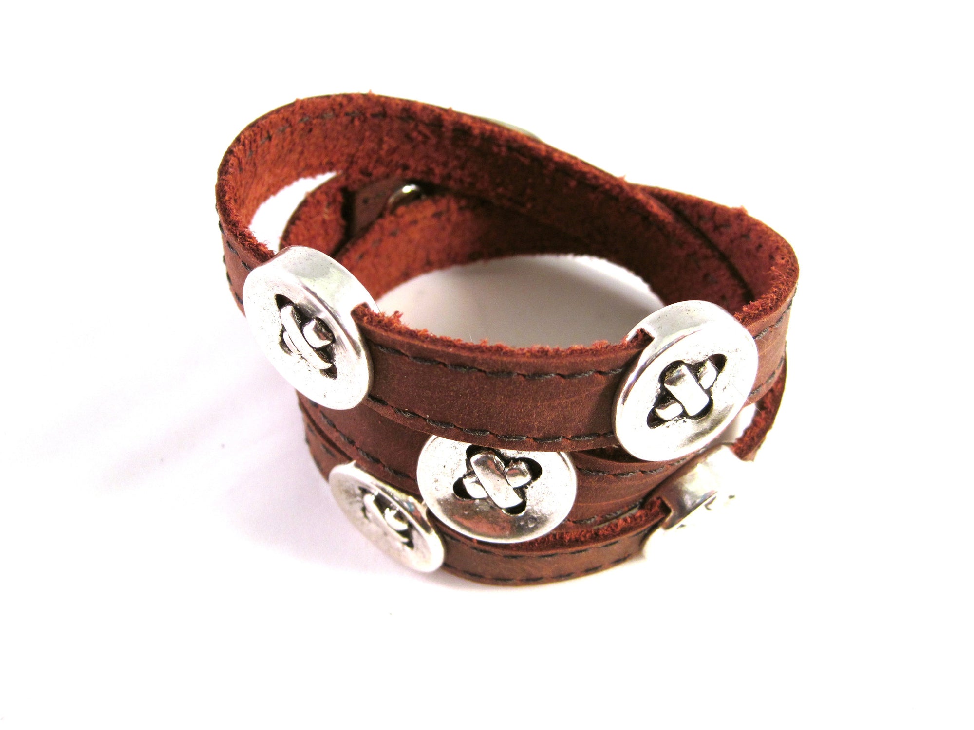 LEATHER WRAPAROUND WITH FIVE METAL BUTTONS by nyet jewelry.