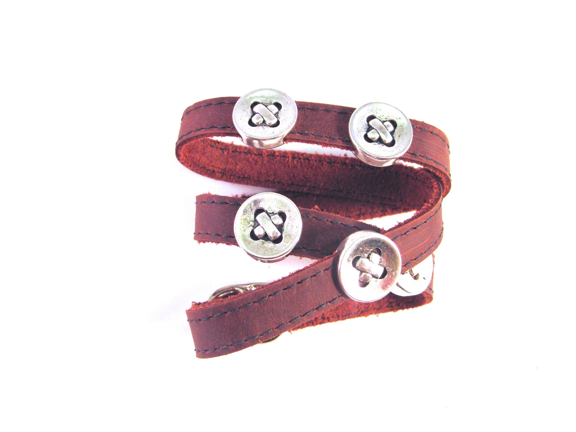 LEATHER WRAPAROUND WITH FIVE METAL BUTTONS by nyet jewelry.