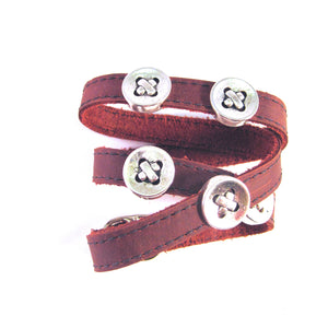 LEATHER WRAPAROUND WITH FIVE METAL BUTTONS by nyet jewelry.