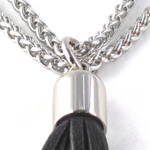 STAINLESS STEEL CHAINS AND LARGE DEERSKIN LEATHER TASSEL NECKLACE  by nyet jewelry.