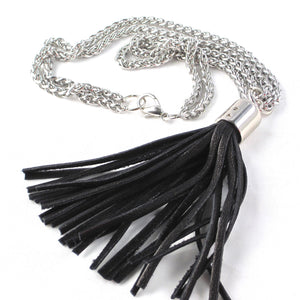 STAINLESS STEEL CHAINS AND LARGE DEERSKIN LEATHER TASSEL NECKLACE  by nyet jewelry.