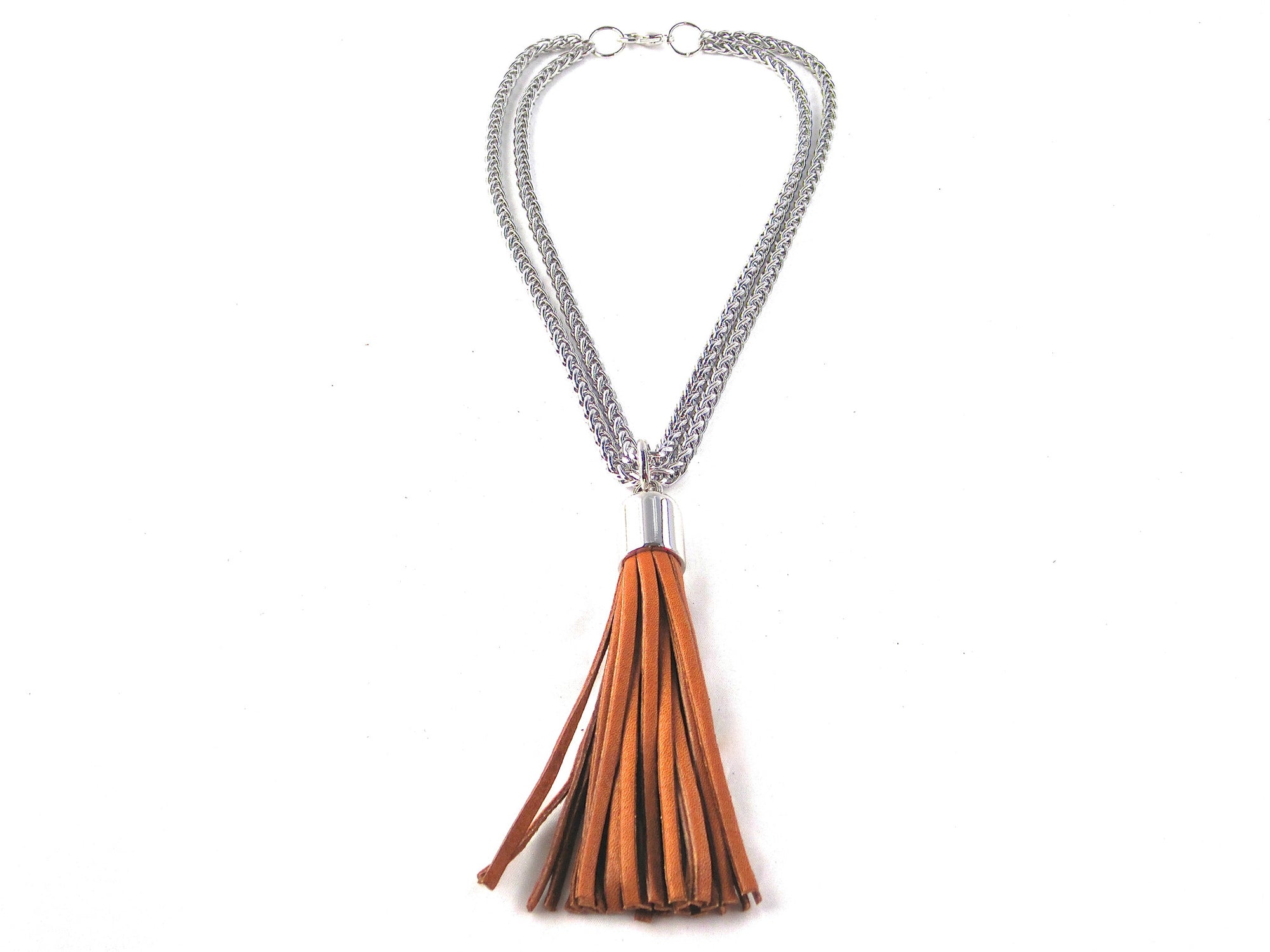 STAINLESS STEEL CHAINS AND LARGE DEERSKIN LEATHER TASSEL NECKLACE by nyet jewelry