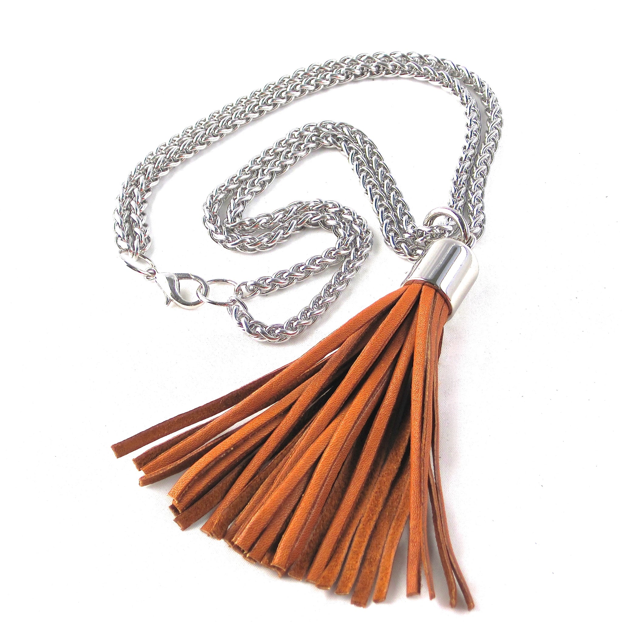 STAINLESS STEEL CHAINS AND LARGE DEERSKIN LEATHER TASSEL NECKLACE by nyet jewelry