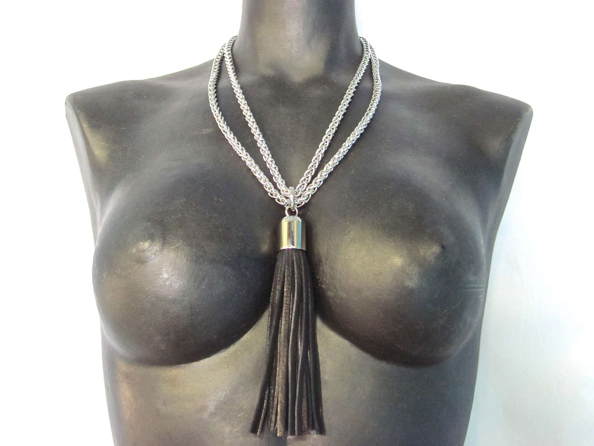 STAINLESS STEEL CHAINS AND LARGE DEERSKIN LEATHER TASSEL NECKLACE  by nyet jewelry.