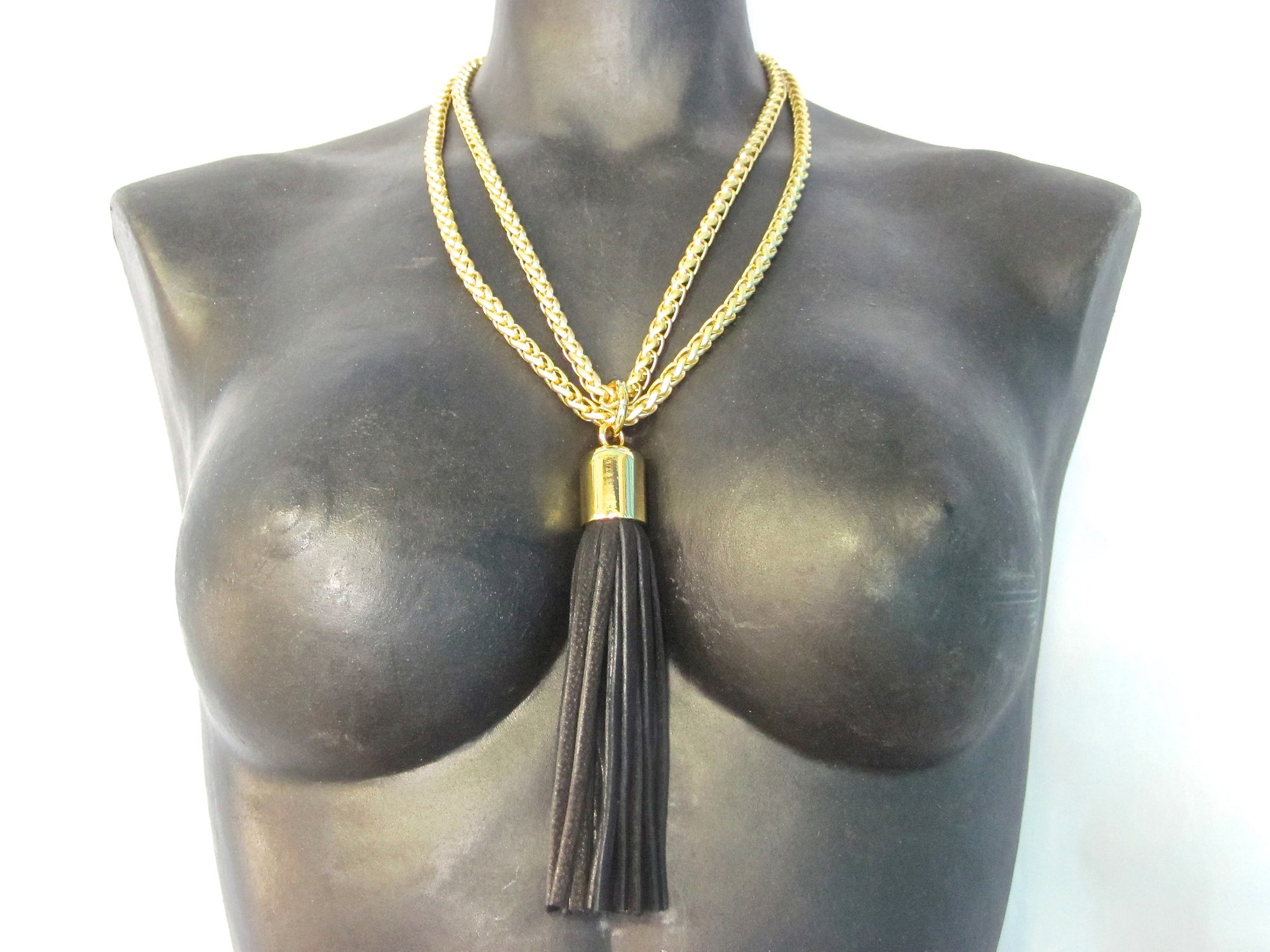 STAINLESS STEEL CHAINS AND LARGE DEERSKIN LEATHER TASSEL NECKLACE  by nyet jewelry.