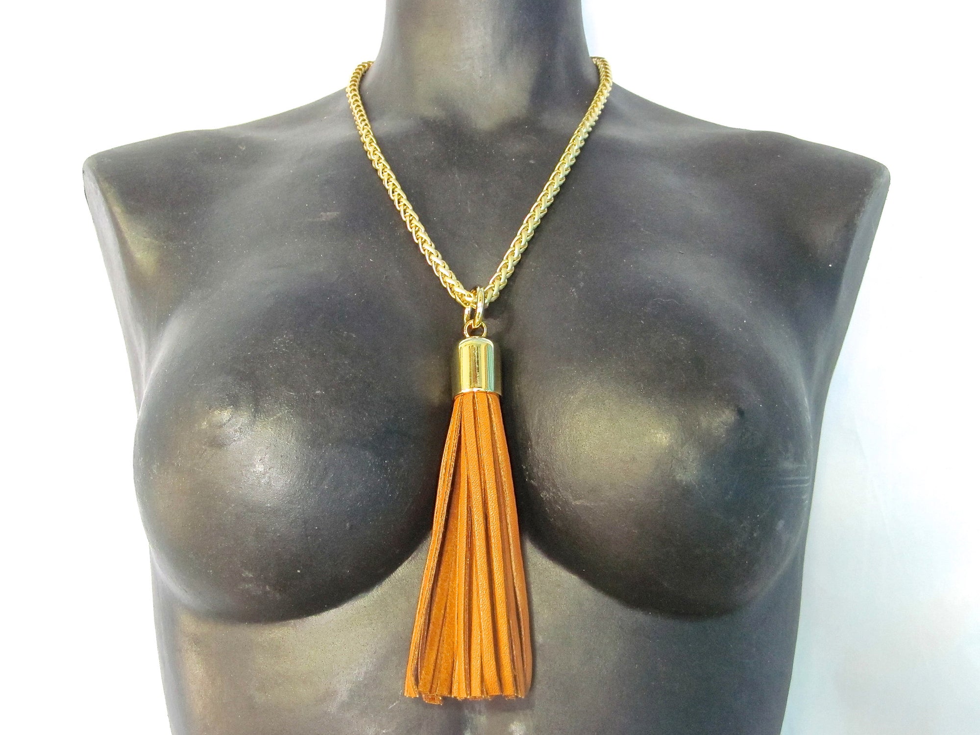 STAINLESS STEEL CHAINS AND LARGE DEERSKIN LEATHER TASSEL NECKLACE by nyet jewelry