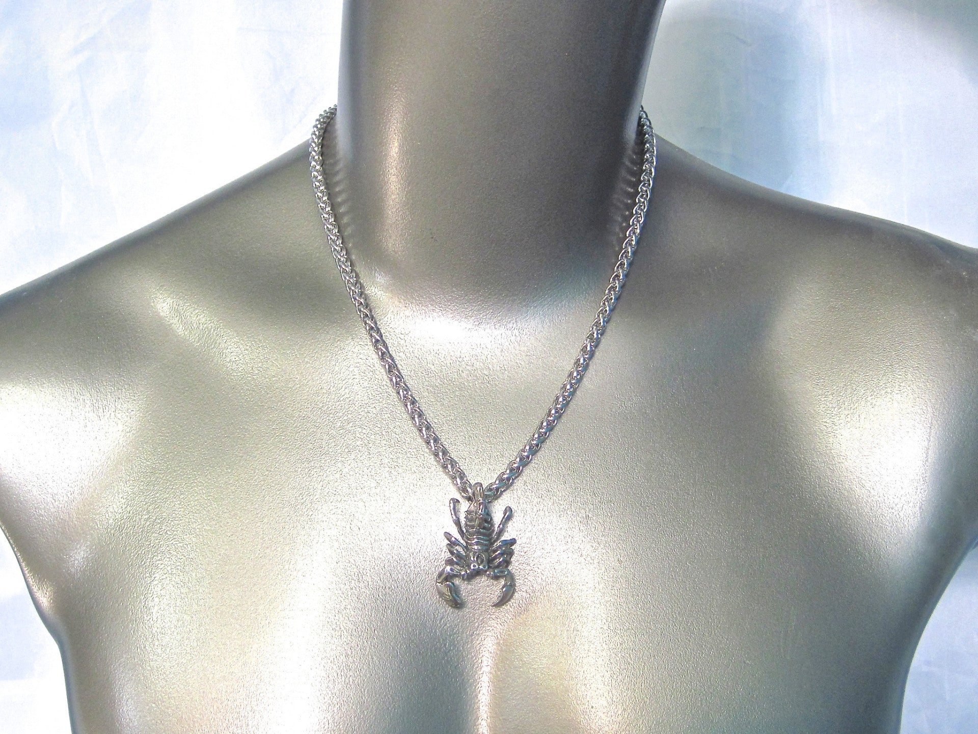 ROUND STAINLESS STEEL CHAIN NECKLACE WITH HEAVYWEIGHT SCORPION PENDANT. by nyet jewelry