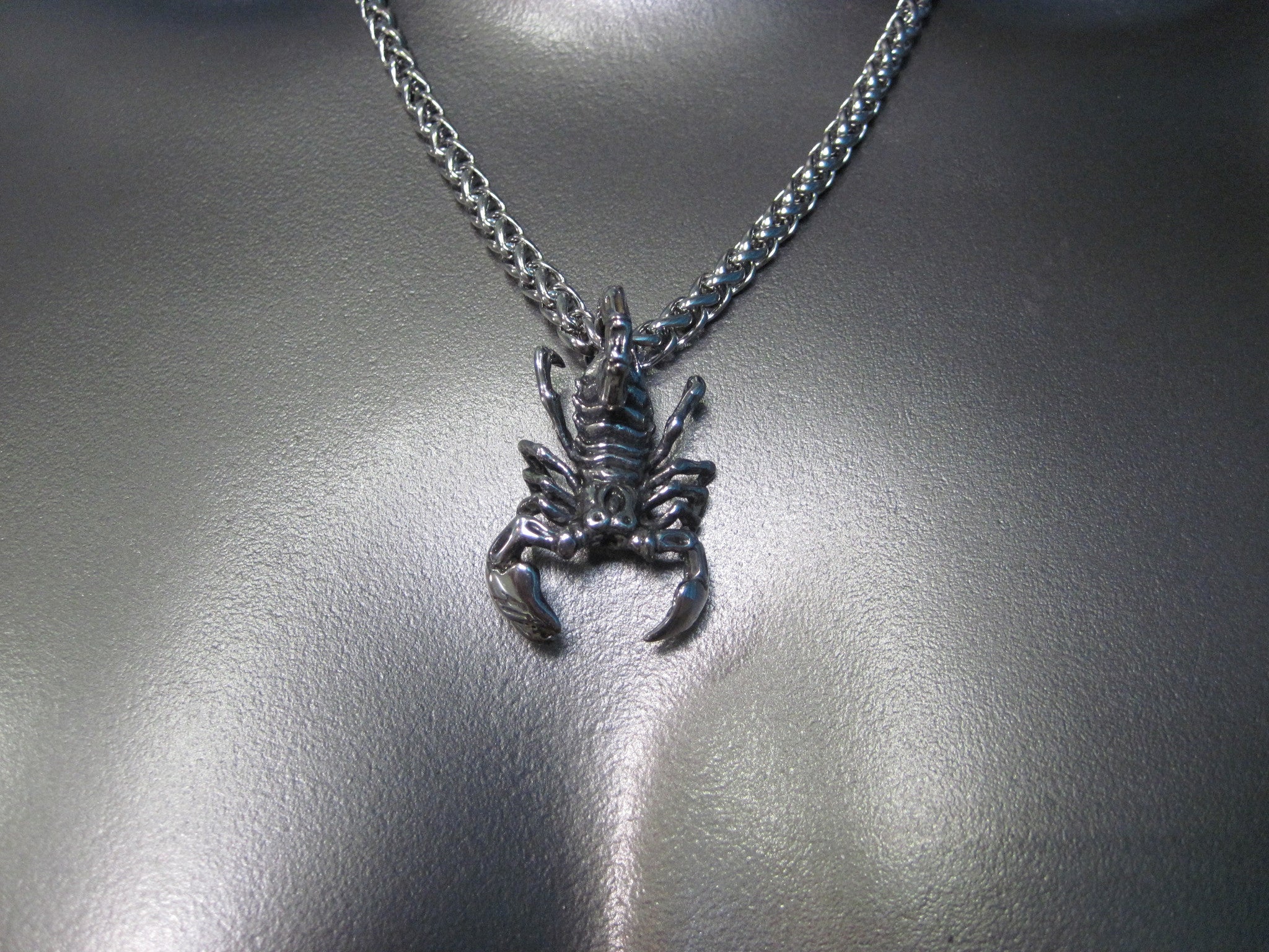 ROUND STAINLESS STEEL CHAIN NECKLACE WITH HEAVYWEIGHT SCORPION PENDANT. by nyet jewelry