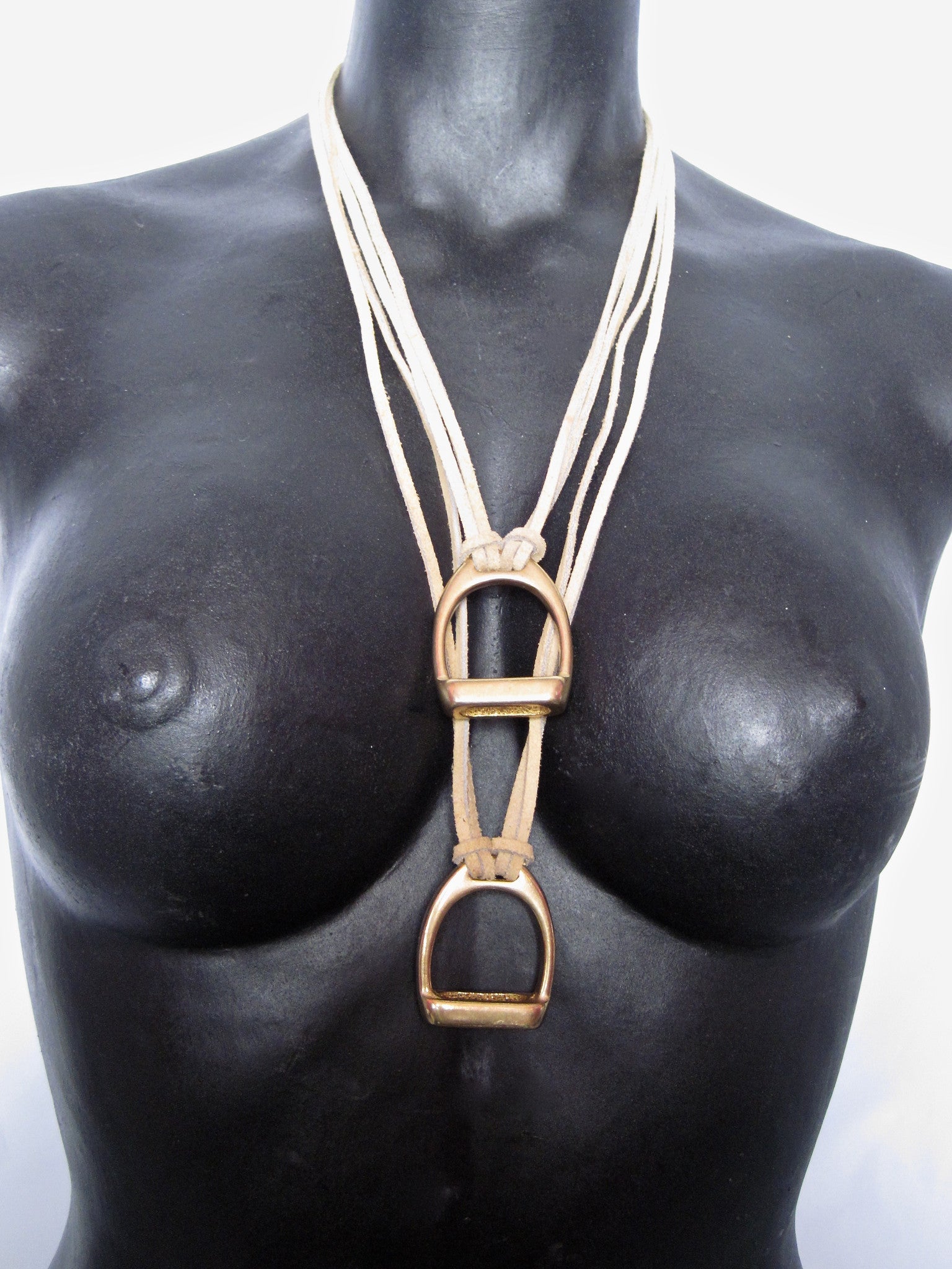 STIRRUP AND SUEDE NECKLACE BY NYET JEWELRY.