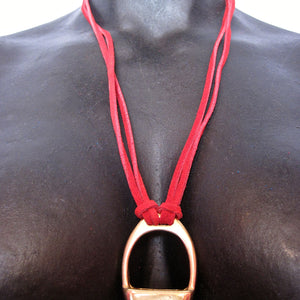 STIRRUP AND SUEDE NECKLACE BY NYET JEWELRY.