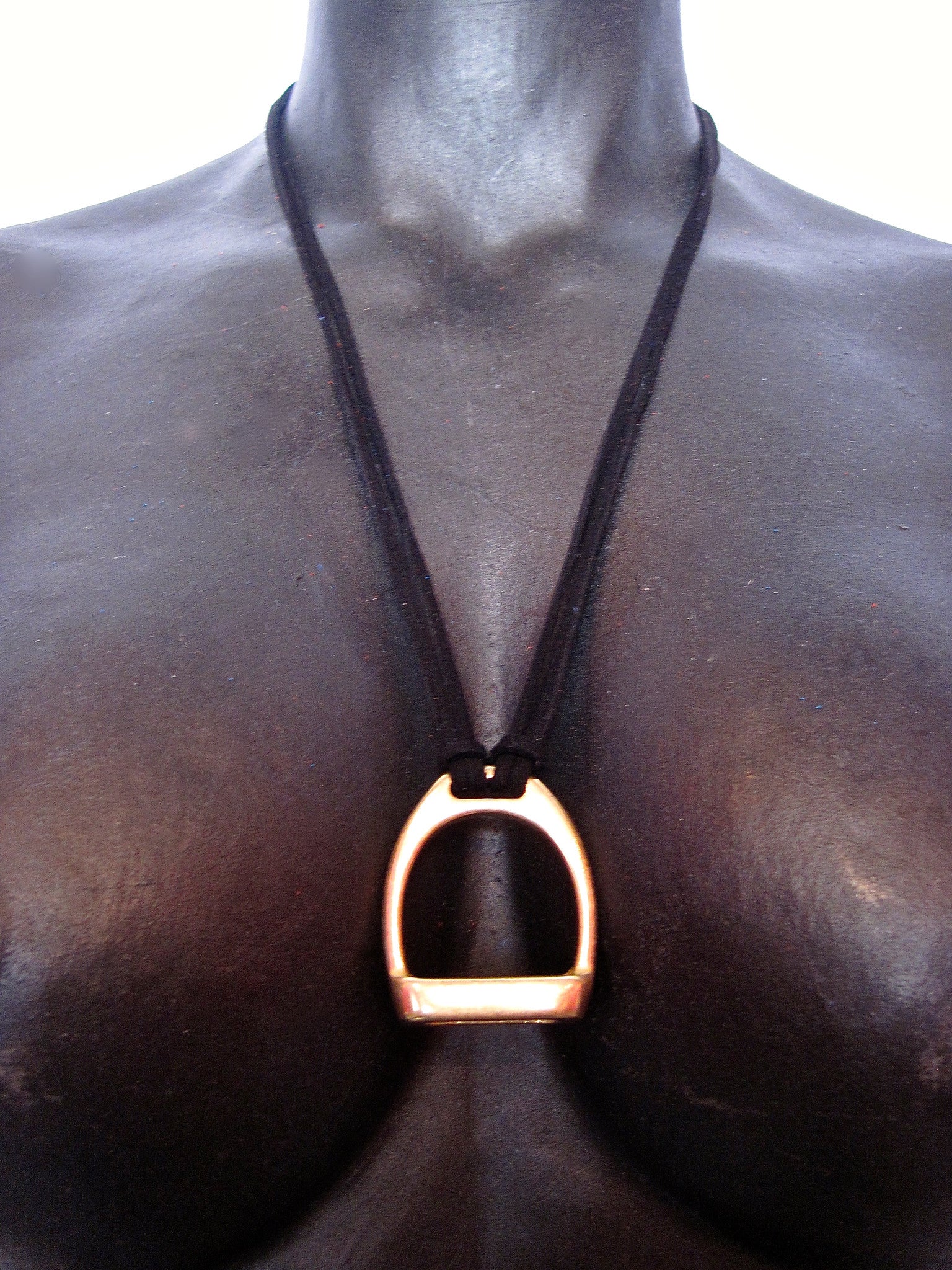 STIRRUP AND SUEDE NECKLACE BY NYET JEWELRY.