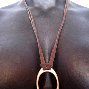 STIRRUP AND SUEDE NECKLACE BY NYET JEWELRY.