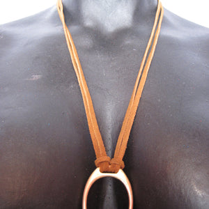 STIRRUP AND SUEDE NECKLACE BY NYET JEWELRY.