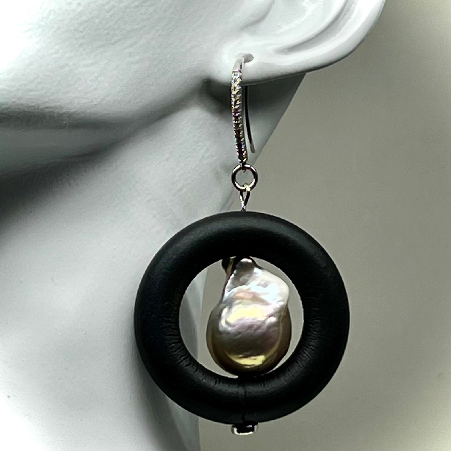 BLACK RUBBER EARRINGS WITH GENUINE BAROQUE PEARLS AND SILVER ENDCAPS. by nyet jewelry 