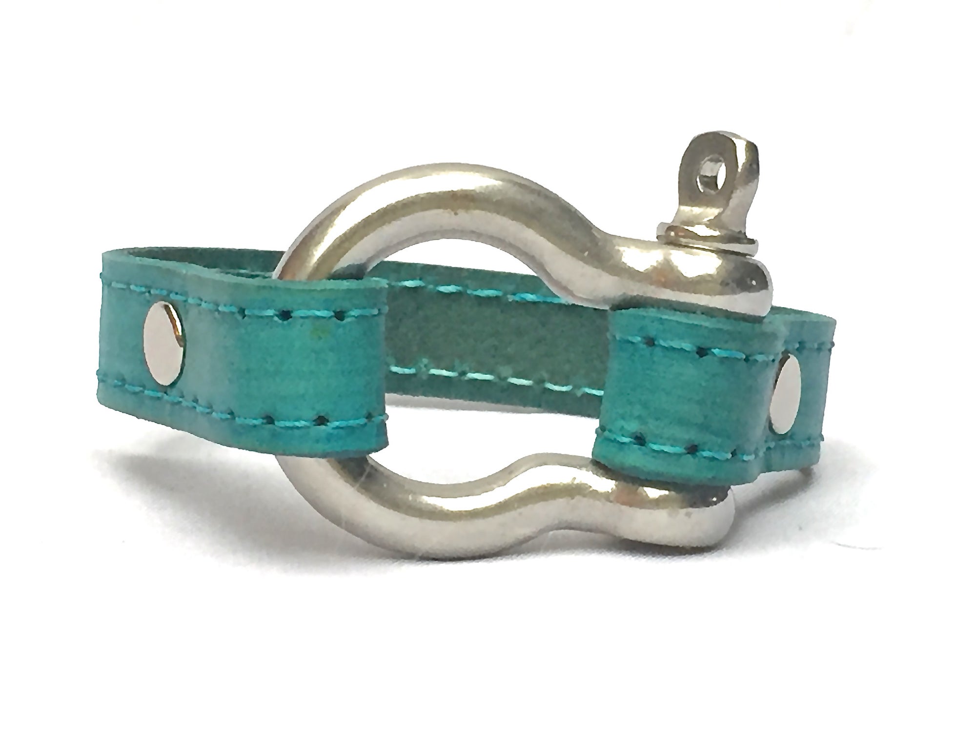 STITCHED LEATHER AND STAINLESS STEEL SHACKLE by nyet jewelry.