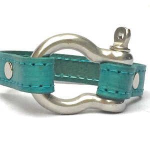 STITCHED LEATHER AND STAINLESS STEEL SHACKLE by nyet jewelry.