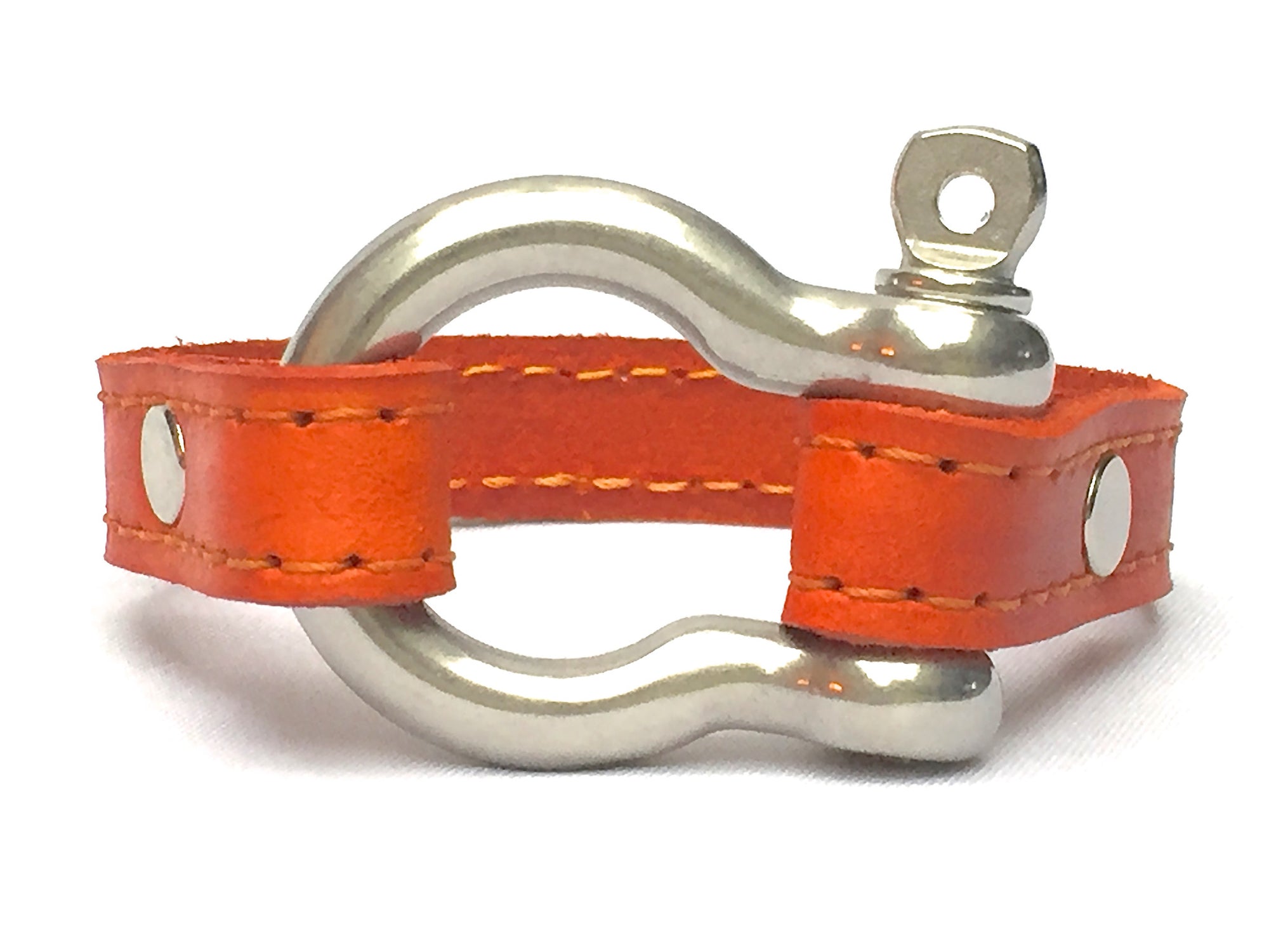 STITCHED LEATHER AND STAINLESS STEEL SHACKLE by nyet jewelry.