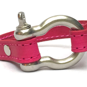 STITCHED LEATHER AND STAINLESS STEEL SHACKLE by nyet jewelry.