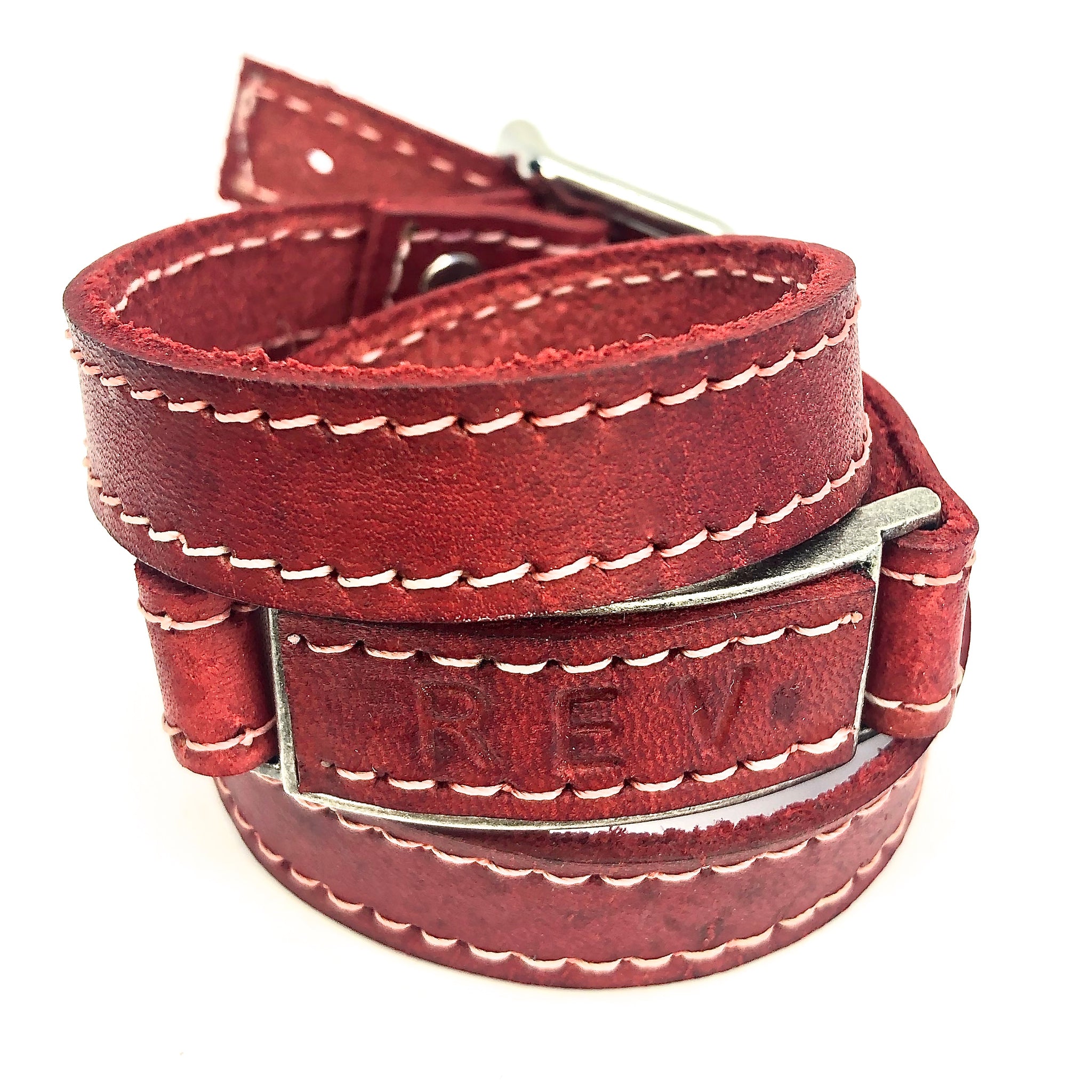 LEATHER WRAPAROUND WITH METAL LINK INLAID WITH MATCHING PIECE OF LEATHER WITH CUSTOM ENGRAVING by nyet jewelry