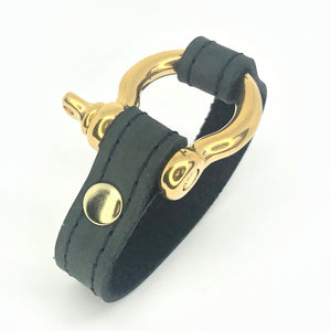 signature bracelet with gold shackle by nyet jewelry