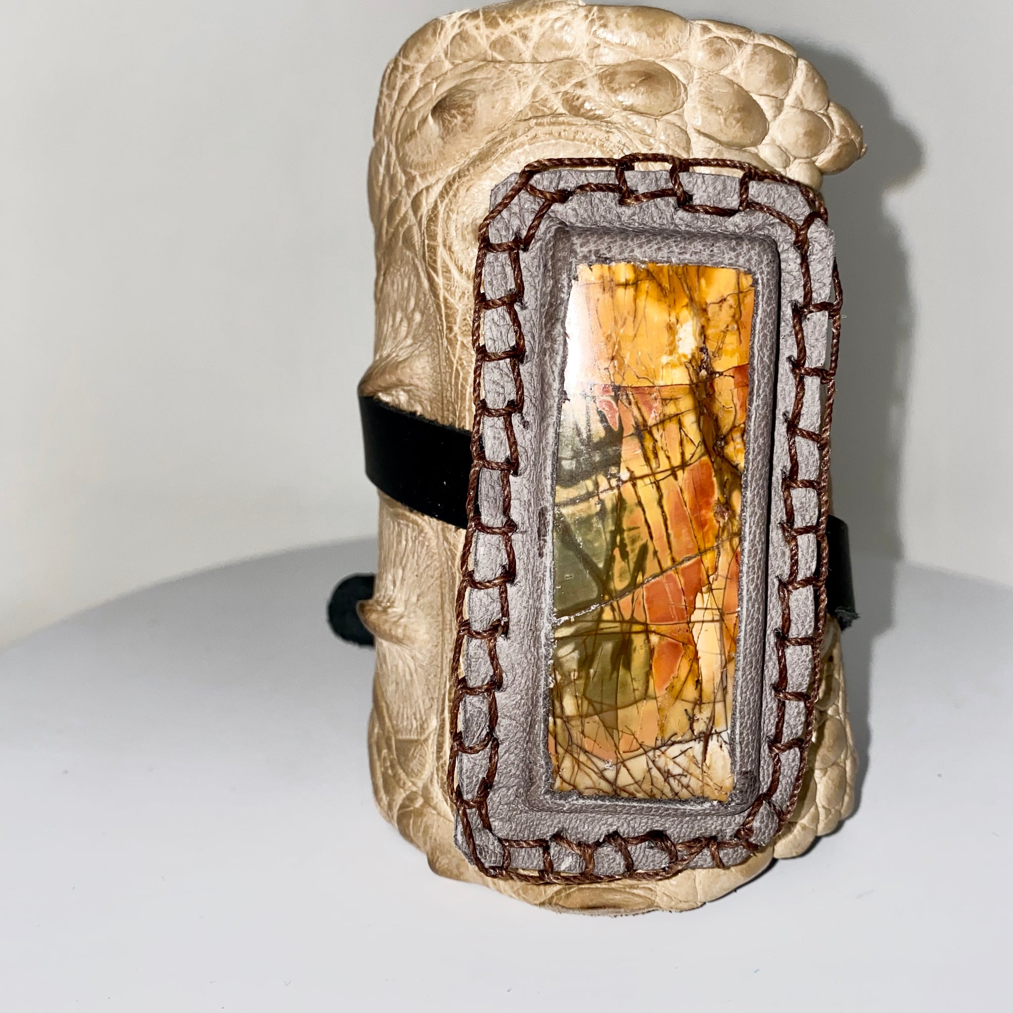 crocodile cuff with large stone set in leather by NYET Jewelry.