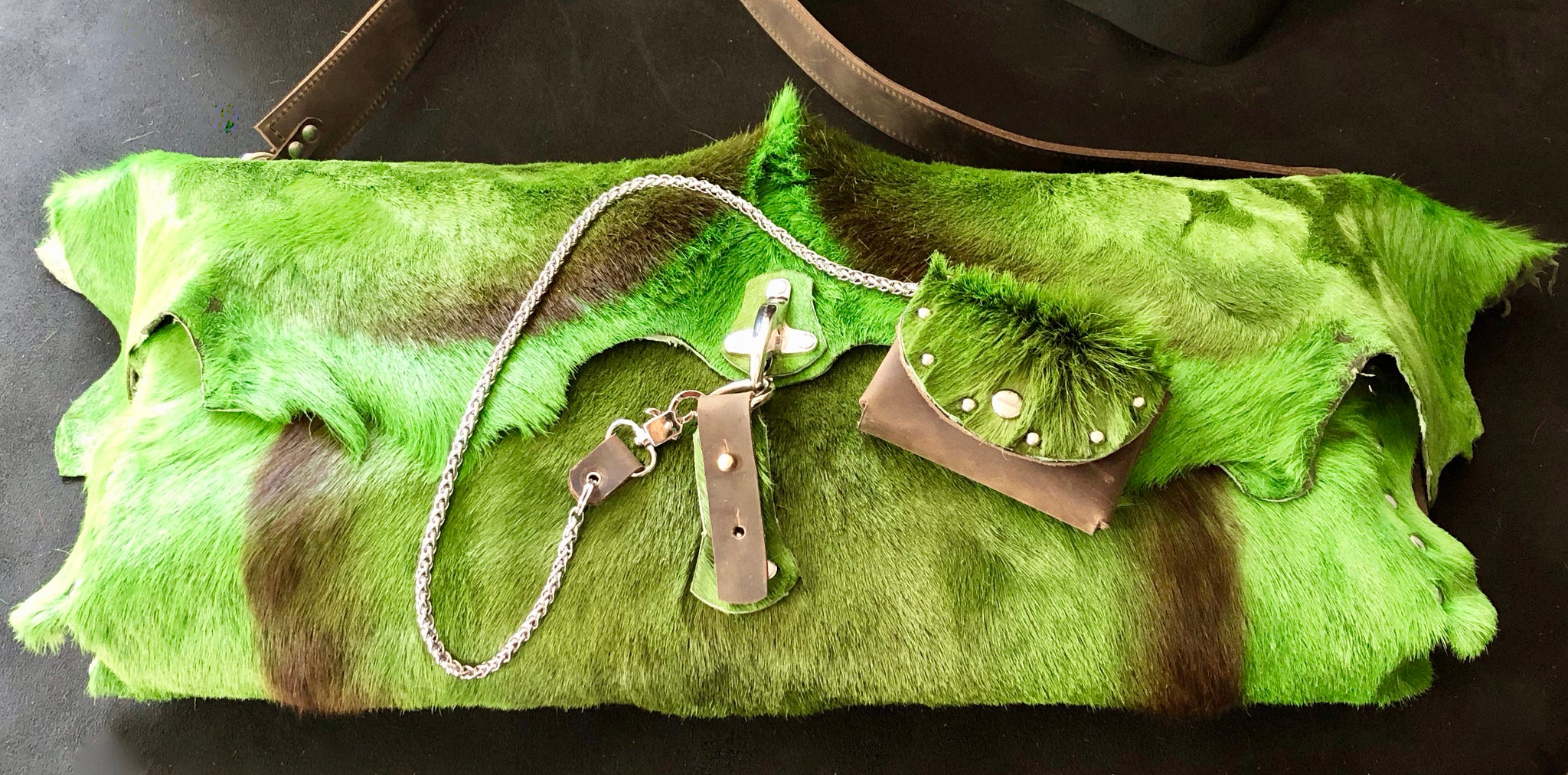 BRIGHTLY DYED SPRINGBOK OVERSIZED BAG WITH METAL HARDWARE AND MATCHING CHAIN WALLET by Nyet Jewelry