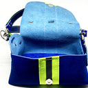 HAIR-ON COWHIDE LEATHER WITH WIDE NEON YELLOW REFLECTIVE TRIM. By NYET Jewelry.