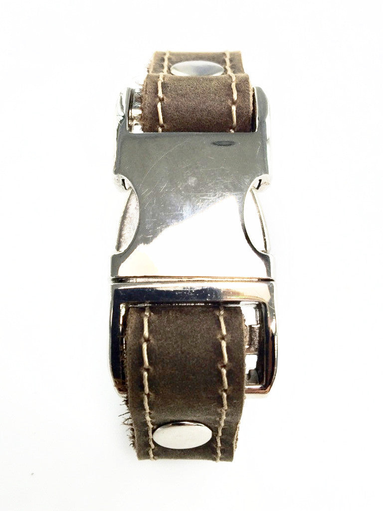 Distressed leather bracelet with side squeeze aluminum buckle